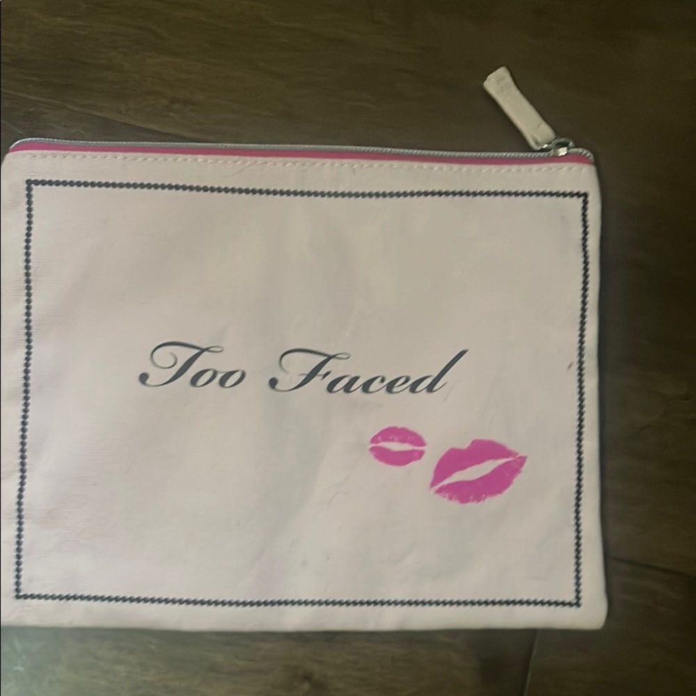 Too Faced Pink and White Cosmetic Bag with Playful Design